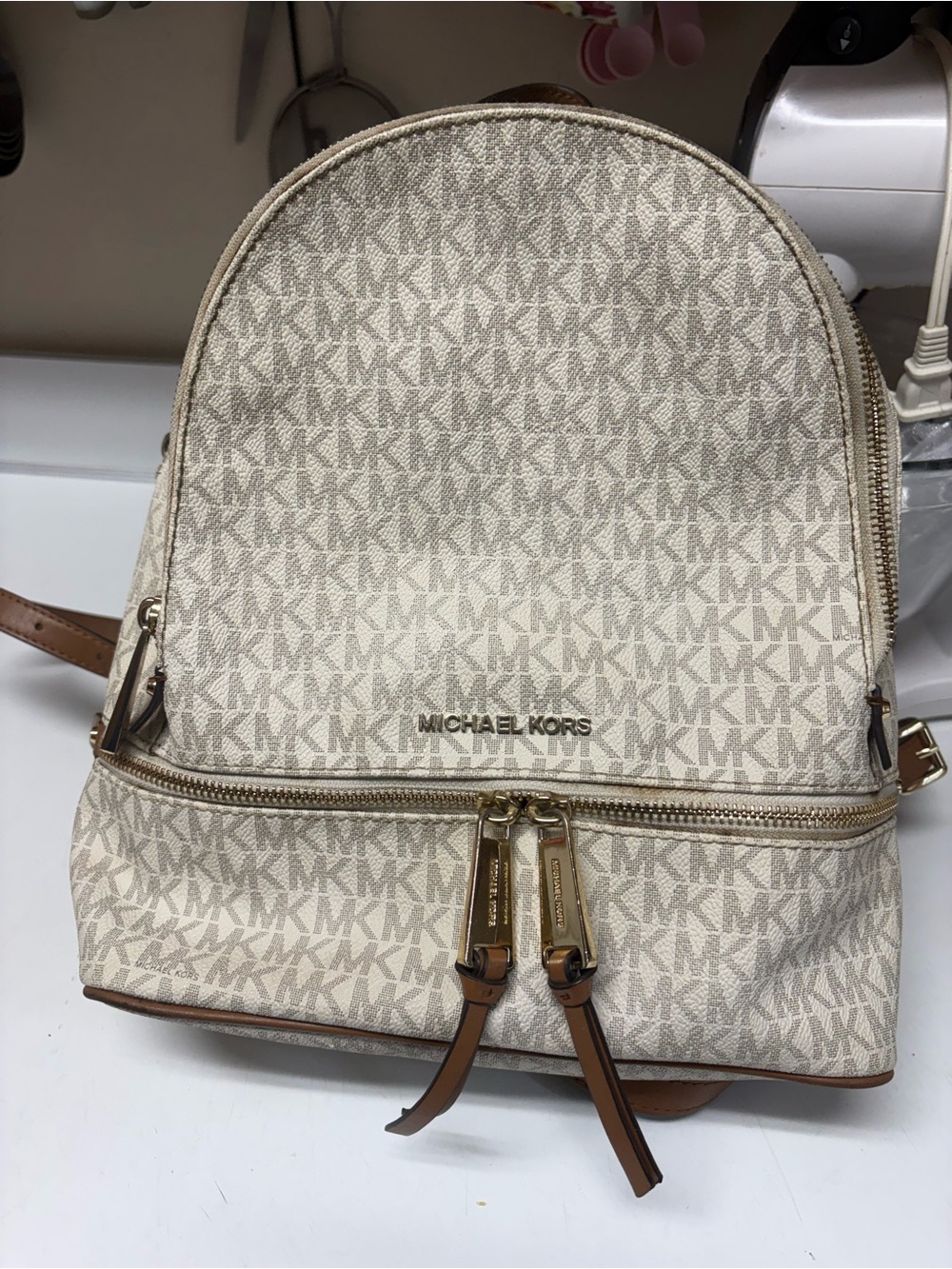 Fair condition Michael Kors Cream Monogram Zip-Front Backpack with Gold Hardware